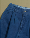 View of model wearing Blue Made in USA, Double Pleated Denim Pants - 26 x 30.