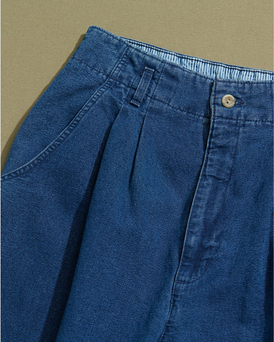 View of model wearing Blue Made in USA, Double Pleated Denim Pants - 26 x 30.