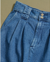 View of model wearing Blue Made in USA, Pleated Denim Skirt - 28 x 30.