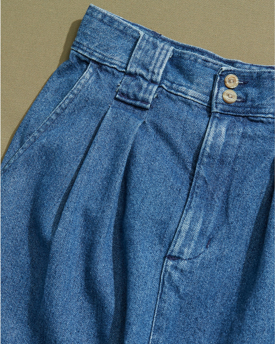 View of model wearing Blue Made in USA, Pleated Denim Skirt - 28 x 30.