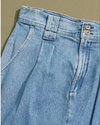 View of model wearing Blue Made in USA, Pleated Denim Skirt - 33 x 30.