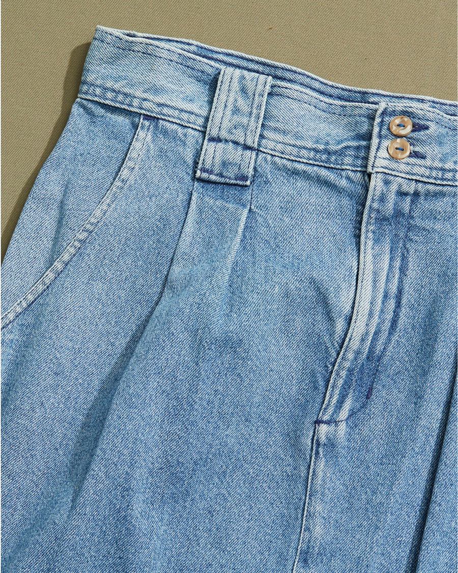 View of model wearing Blue Made in USA, Pleated Denim Skirt - 33 x 30.