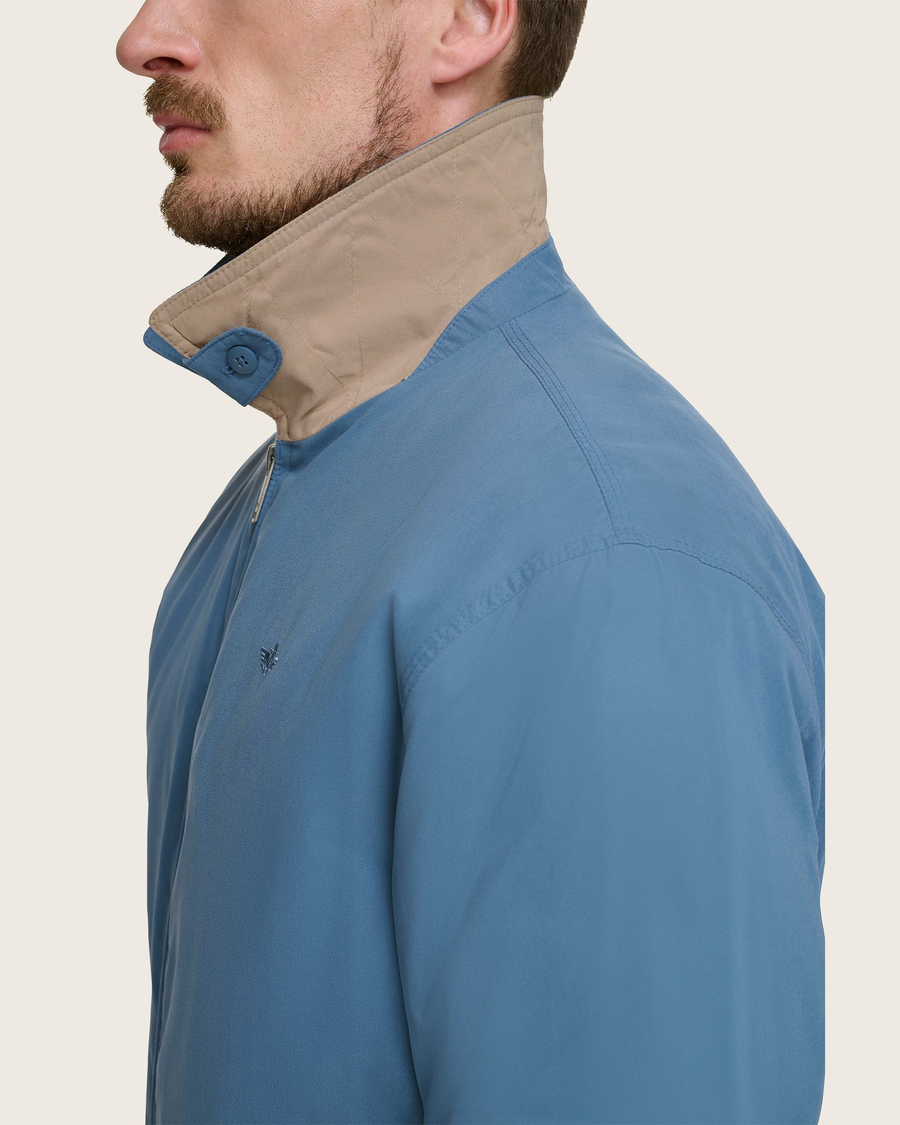 View of model wearing Blue Microtwill Relaxed Bomber Jacket.