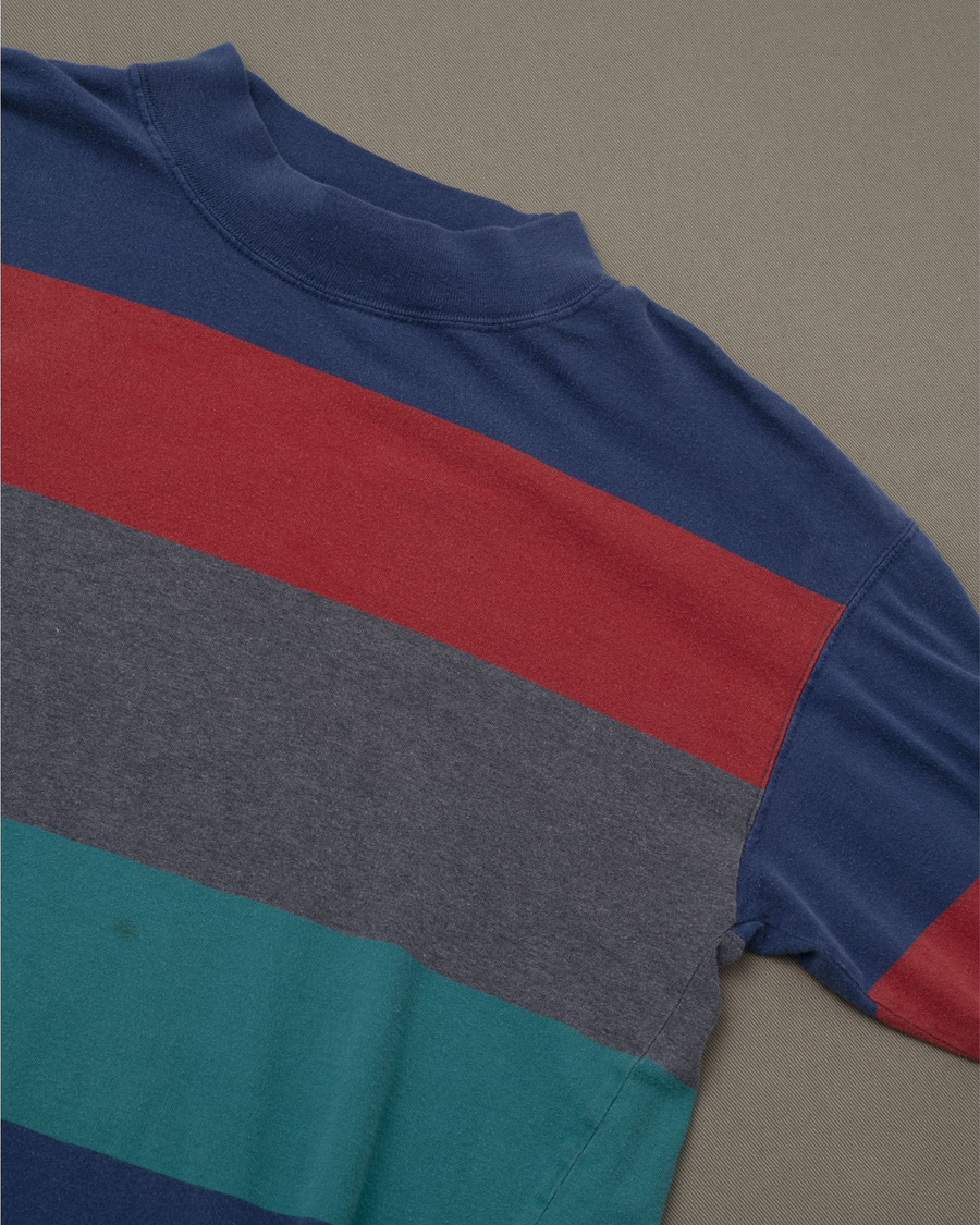 View of model wearing Blue Multicolor Striped Long Sleeve Tee - M.