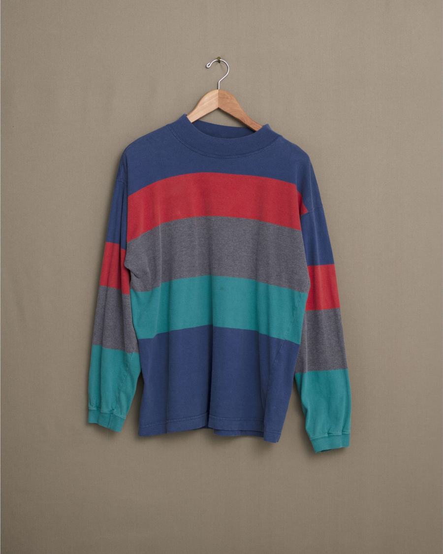 Front view of model wearing Blue Multicolor Striped Long Sleeve Tee - M.