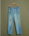 Front view of model wearing Blue Reverse Double Pleated Denim Pants - 34 x 33.