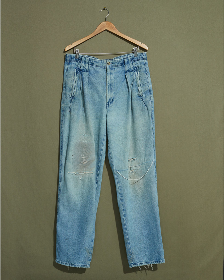 Front view of model wearing Blue Reverse Double Pleated Denim Pants - 34 x 33.