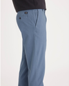 Side view of model wearing Bluefin Ultimate Chino, Slim Fit.