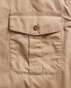 View of model wearing Broad Khaki Dockers® x Transnomadica Button-Down Shirt.