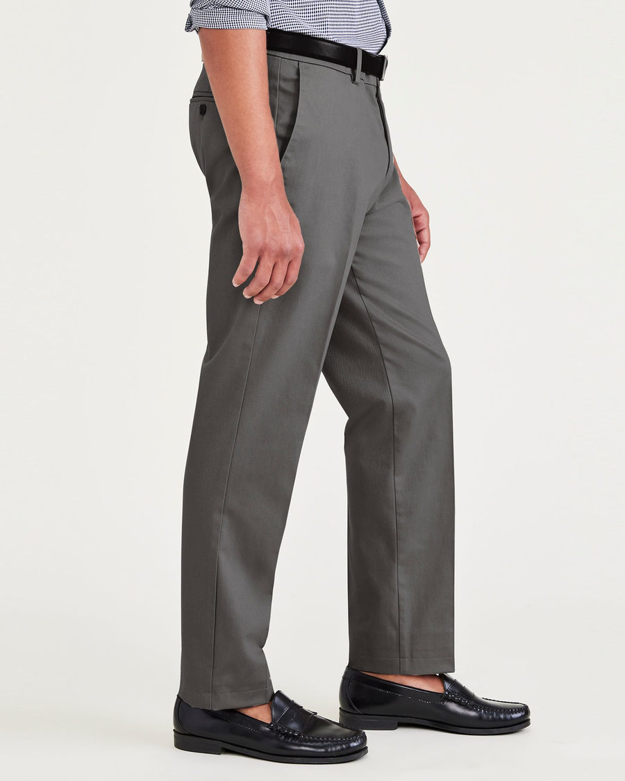 Side view of model wearing Burma Grey Signature Iron Free Khakis, Slim Fit with Stain Defender®.