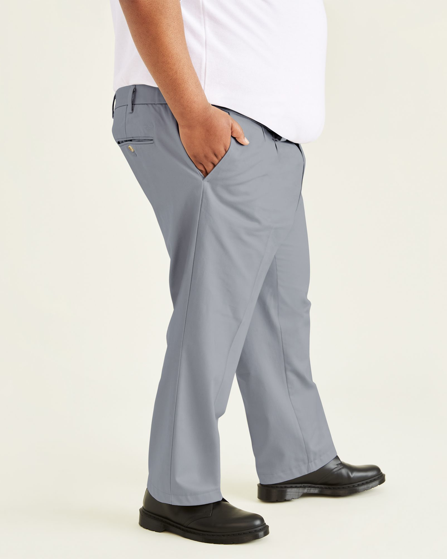 Side view of model wearing Burma Grey Signature Khakis, Pleated, Classic Fit (Big and Tall).