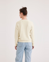 Back view of model wearing Buttercream Sweater, Regular Fit.