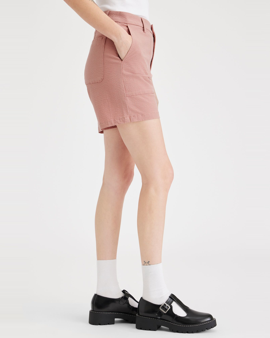 Side view of model wearing Cameo Brown Mid-Rise Short.