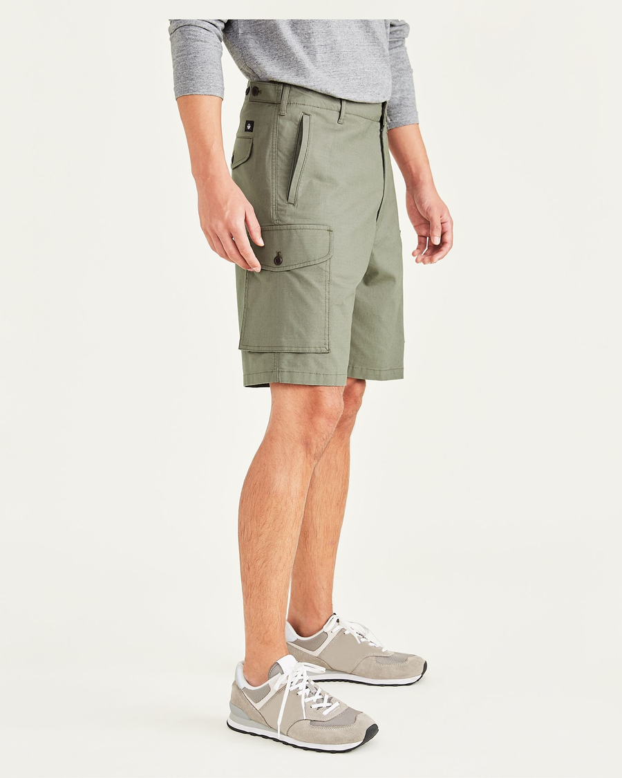 Side view of model wearing Camo Cargo 9" Shorts, Classic Fit.