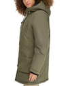 View of model wearing Camo Olive Hooded Parka.