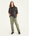 Front view of model wearing Camo Rec Utility Pants, Straight Fit.