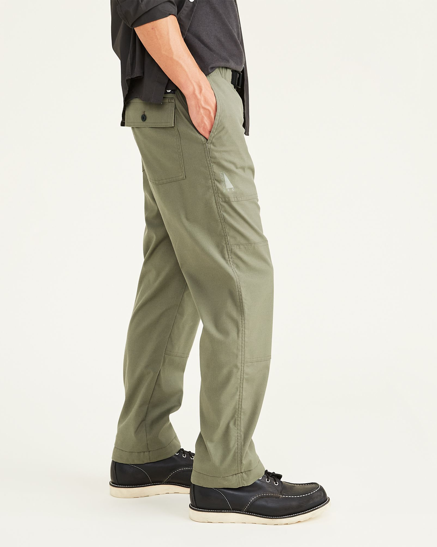 Side view of model wearing Camo Rec Utility Pants, Straight Fit.