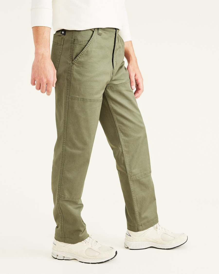 Side view of model wearing Camo Utility Pants, Straight Fit.