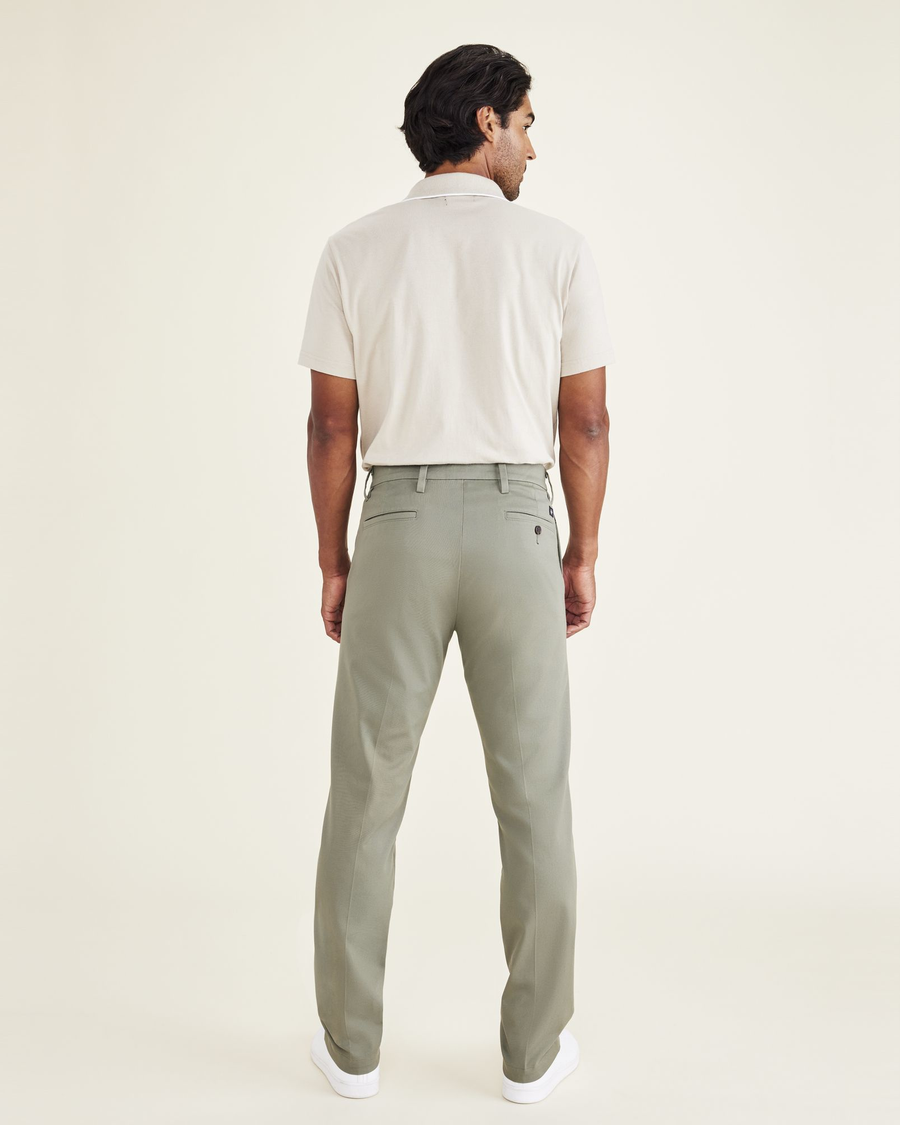 Back view of model wearing Camo Workday Khakis, Slim Fit.