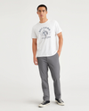 View of model wearing Car Park Grey Essential Chinos, Slim Fit.