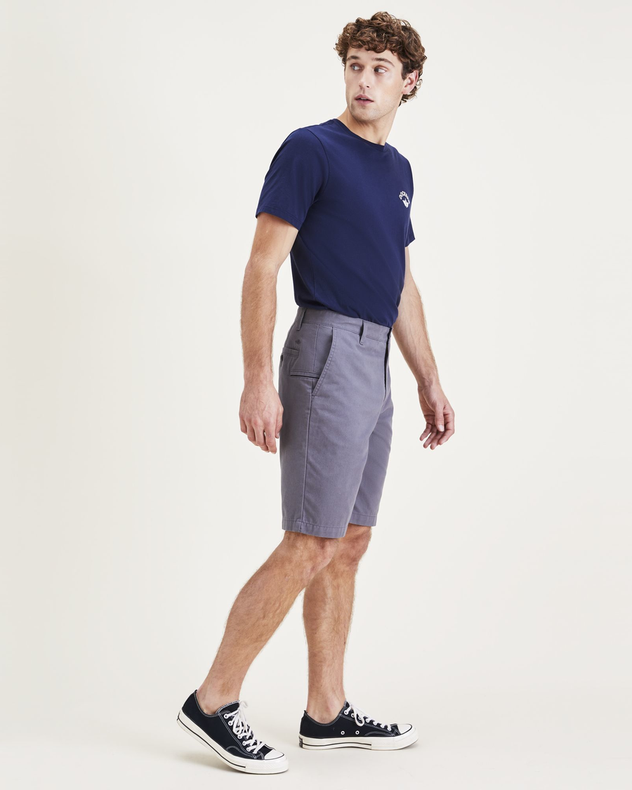 Side view of model wearing Car Park Grey Perfect 10.5" Shorts.