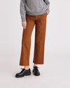 Front view of model wearing Caramel Cafe Weekend Chinos, High Straight Fit.