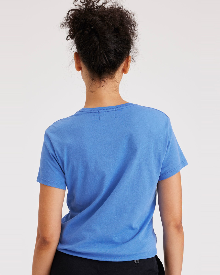Back view of model wearing Ceramic Blue Graphic Tee Shirt, Slim Fit.