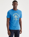 Front view of model wearing Ceramic Blue Worldwide Graphic Tee, Slim Fit.