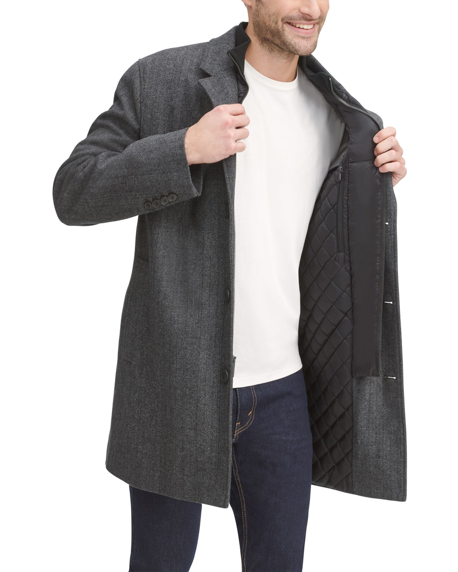 View of model wearing Charcoal Herringbone Wool Blend Top Coat, Regular Fit.