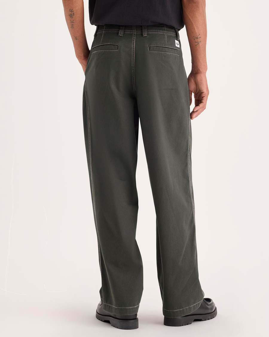 Back view of model wearing Chimera Eighty-Six Alpha Chino Pants, Loose Fit.