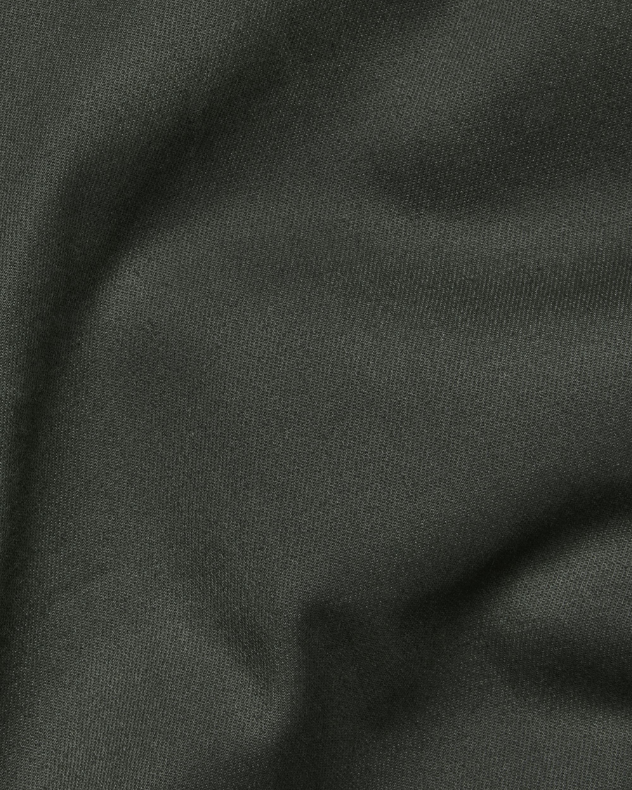 View of model wearing Chimera Signature Iron Free Khakis, Classic Fit with Stain Defender®.