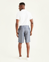 Back view of model wearing Clarke Chambray Faded Navy Perfect 10.5" Shorts.