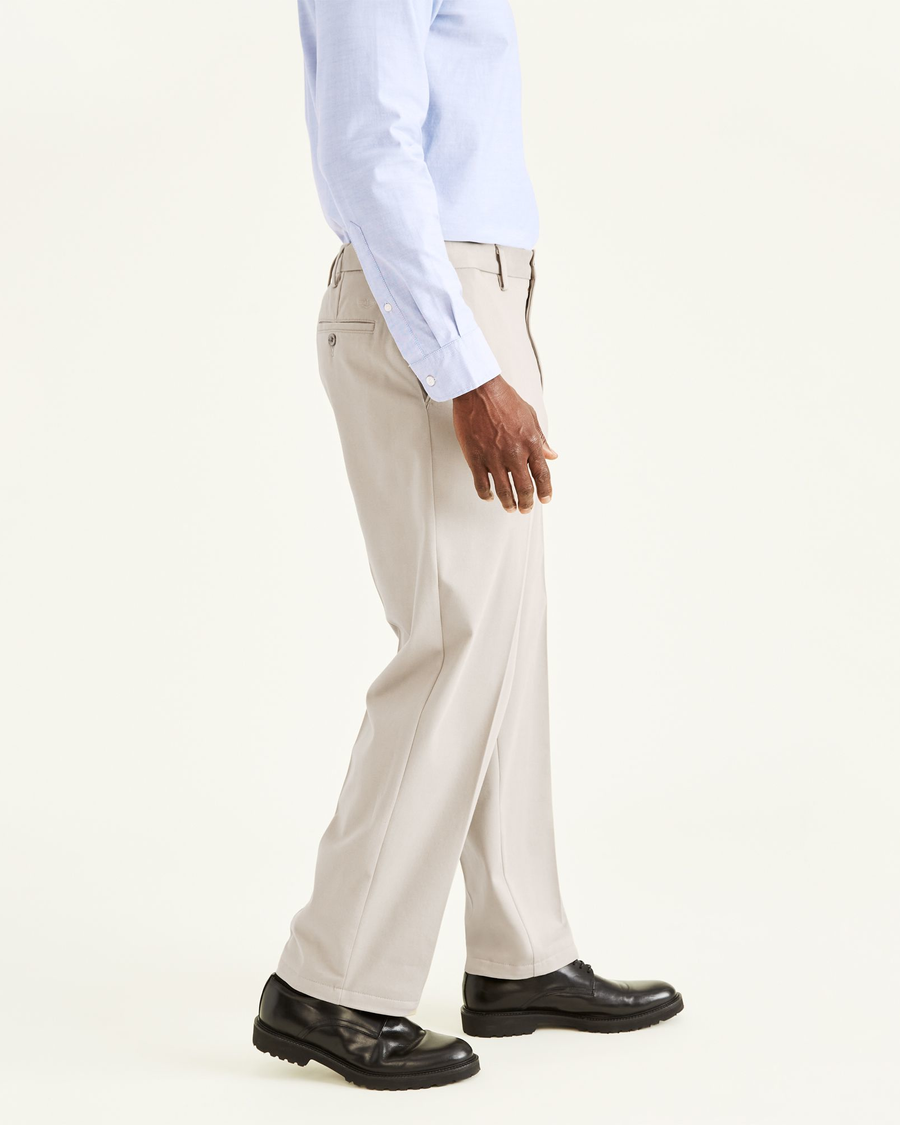Side view of model wearing Cloud Easy Khakis, Classic Fit.