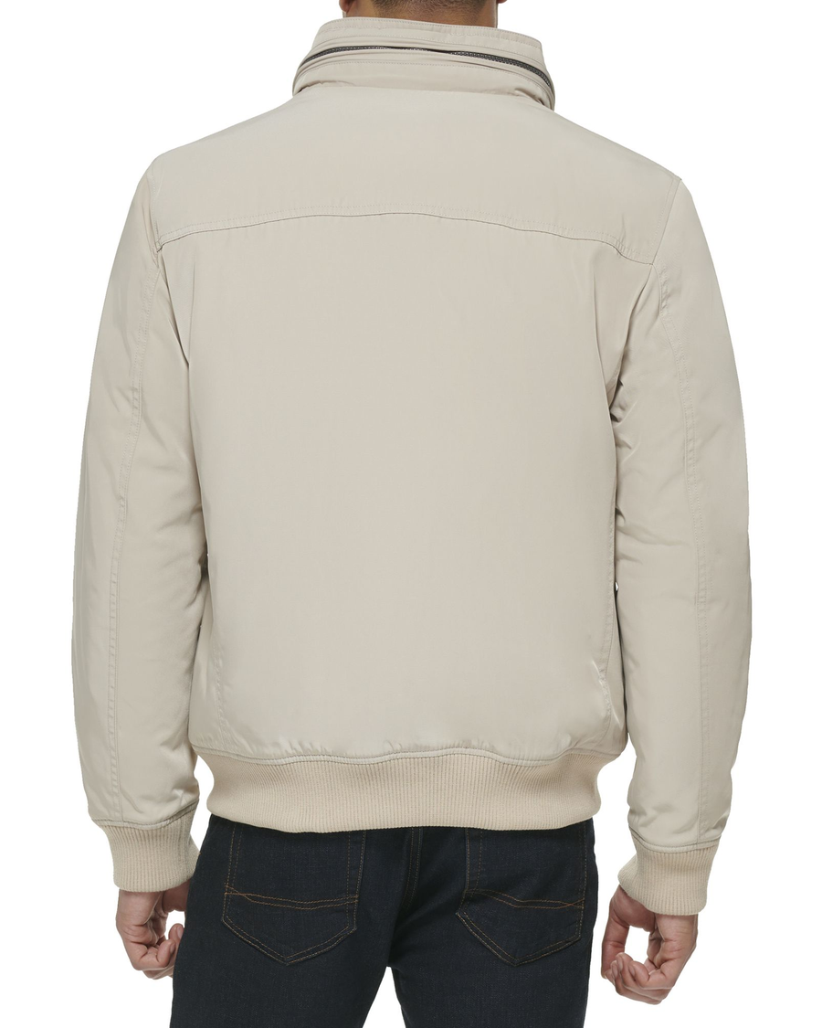 Back view of model wearing Cloud Polytwill 2-Pocket Military Bomber Jacket.