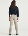 Back view of model wearing Cloud Signature Iron Free Khakis, Classic Fit with Stain Defender®.