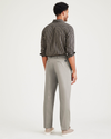 Back view of model wearing Cloud Signature Iron Free Khakis, Pleated, Classic Fit with Stain Defender® (Big and Tall).