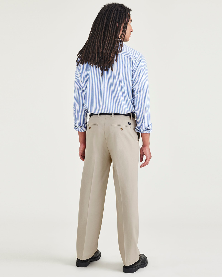 Back view of model wearing Cloud Signature Iron Free Khakis, Relaxed Fit with Stain Defender®.