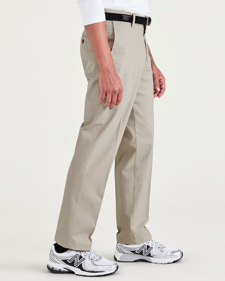 Side view of model wearing Cloud Signature Iron Free Khakis, Straight ...