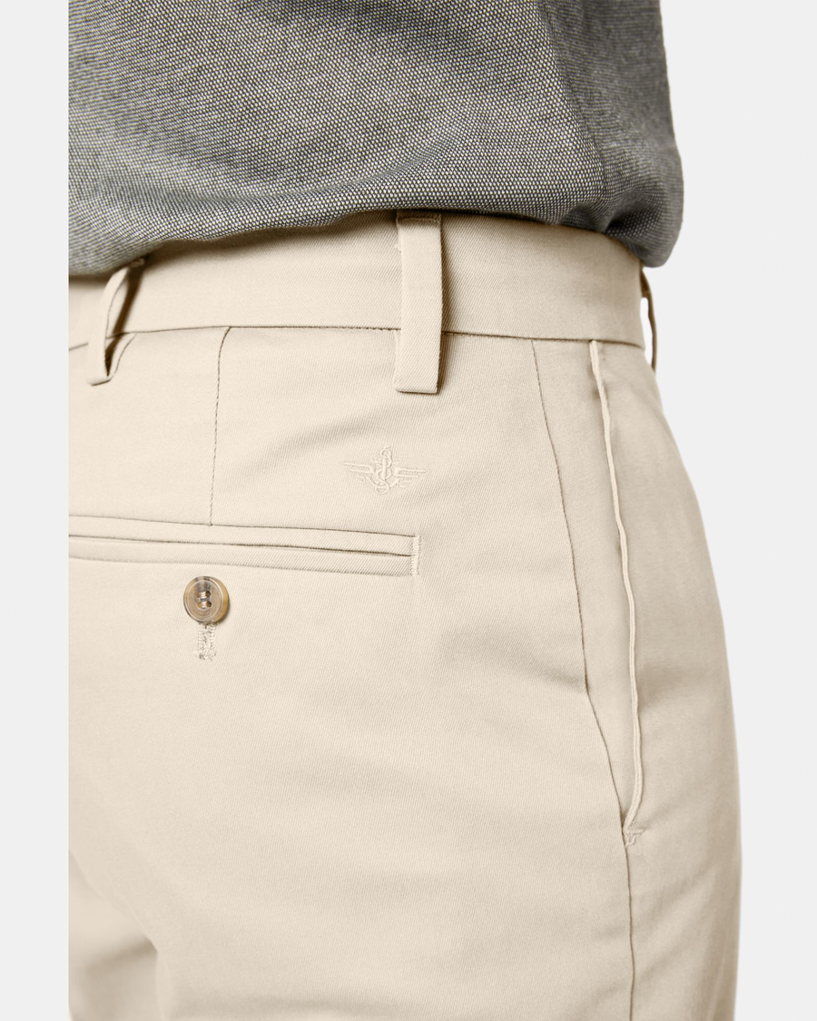 View of model wearing Cloud Signature Khakis, Classic Fit.