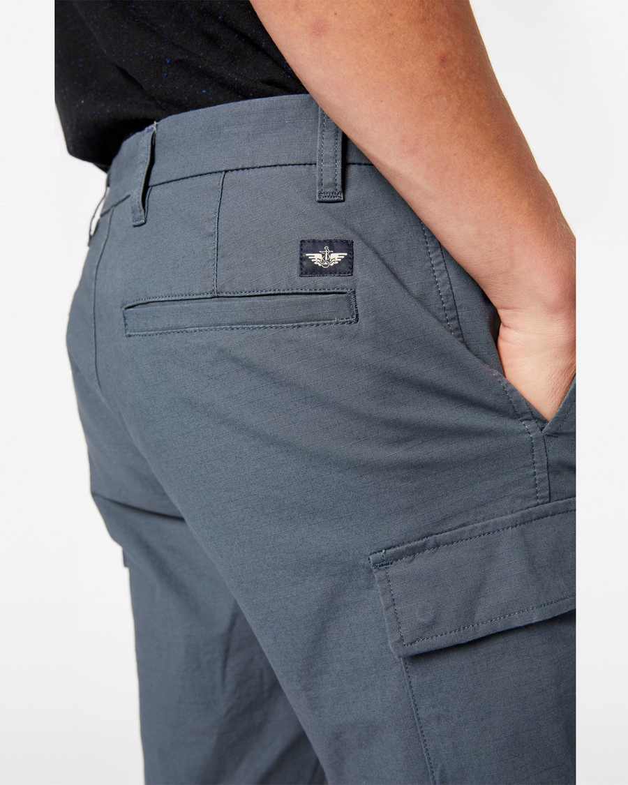 View of model wearing Cool Slate Smart 360 Tech Cargo 9" Shorts (Big and Tall).