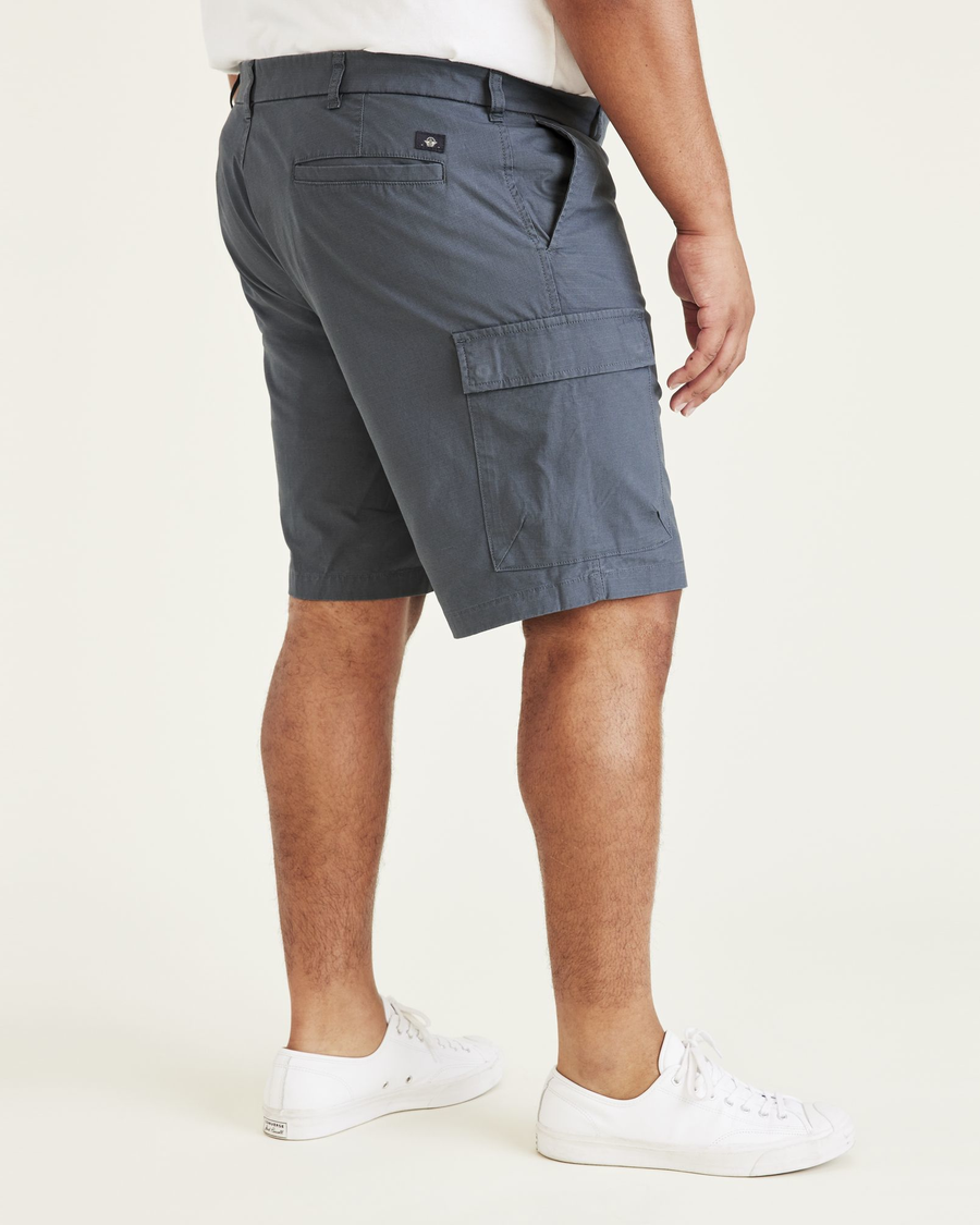 Side view of model wearing Cool Slate Smart 360 Tech Cargo 9" Shorts (Big and Tall).