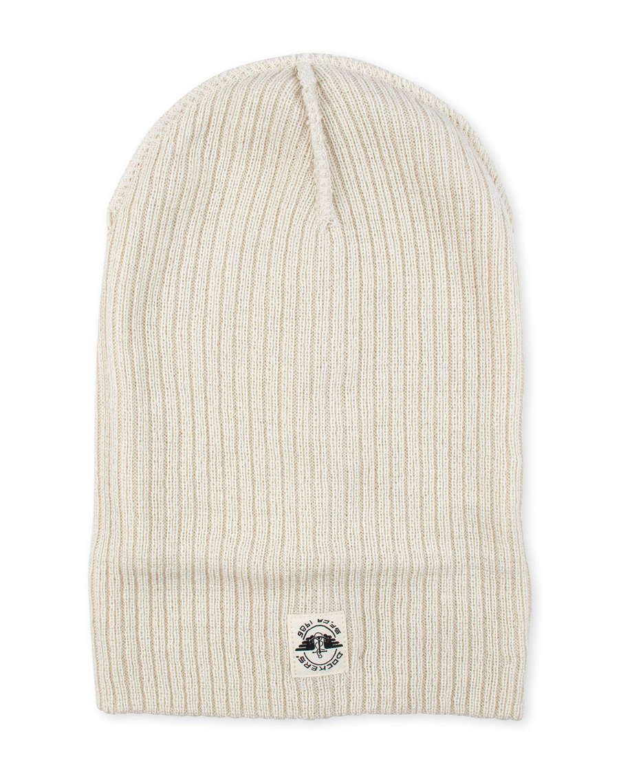 View of  Cream Recycled Double Knit Ribbed Beanie w/ Woven Seasonal Graphic.