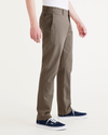 Side view of model wearing Crocodile Stone Wash California Khakis, Slim Fit.