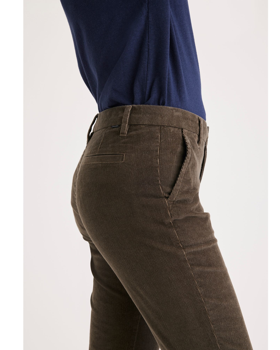 Side view of model wearing Crocodile Weekend Chinos, Slim Fit.