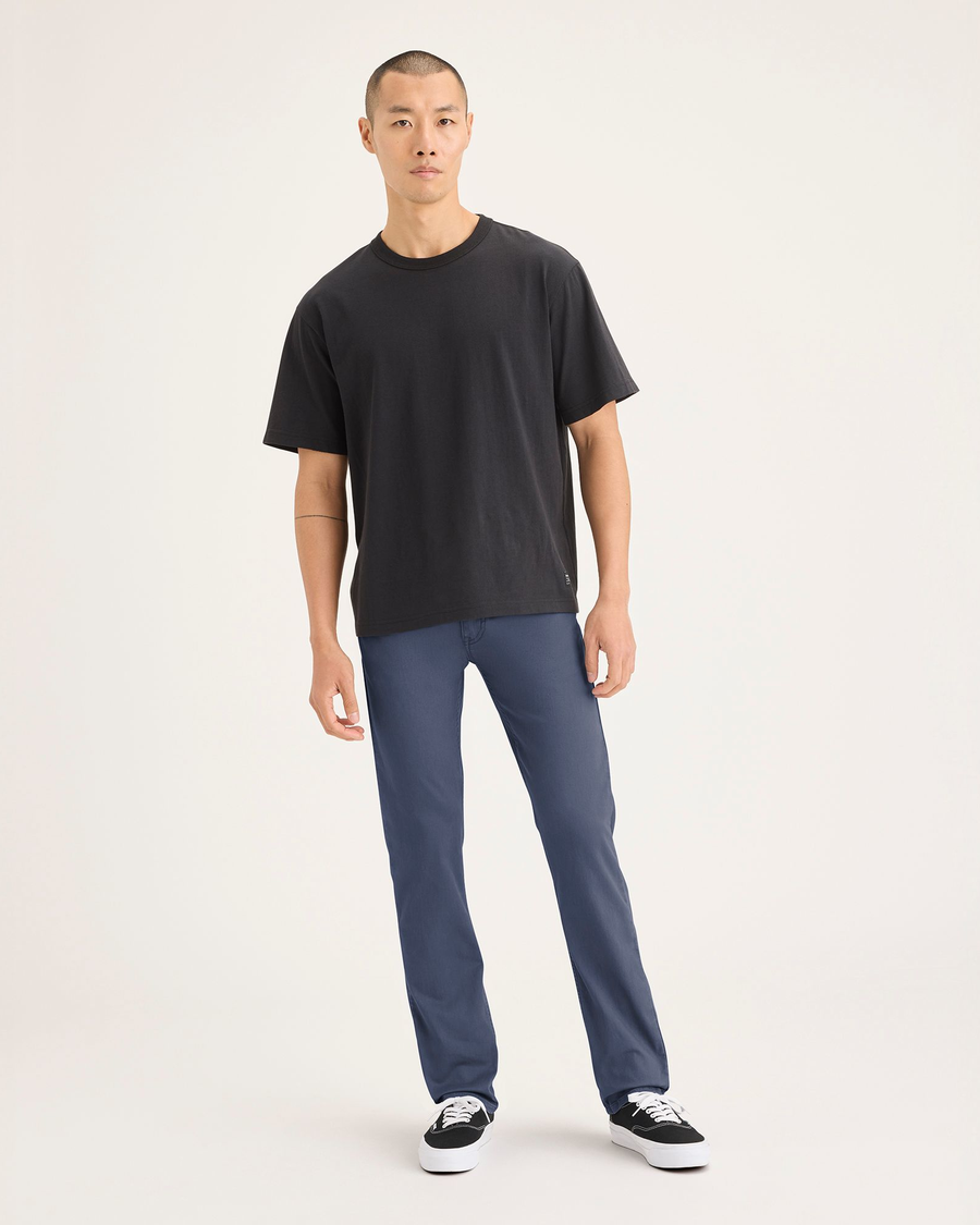 Front view of model wearing Crown Blue Jean Cut Pants, Slim Fit.