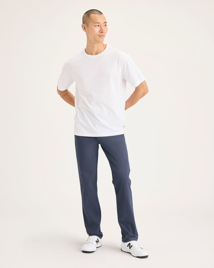 Front view of model wearing Crown Blue Ultimate Chinos, Slim Fit.