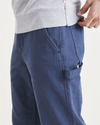 View of model wearing Dark Blue California Carpenter Pants, Straight Fit.