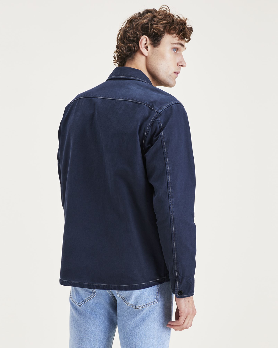 Back view of model wearing Dark Blue Utility Shirt, Relaxed Fit.