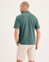 Back view of model wearing Dark Forest Go Raglan Polo, Regular Fit.