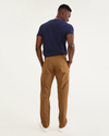 Back view of model wearing Dark Ginger Ultimate Chinos, Athletic Fit.